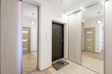 standard room interior apartment. room doors, renovation corridor lobby entrance hall