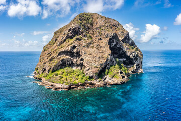 Diamond Rock island in Martinique, France. Diamond Rock is a 175m high basalt island located south...