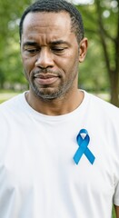 sad black man with awareness ribbon