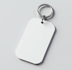 Fototapeta premium Blank white rectangular keychain with silver ring (1)