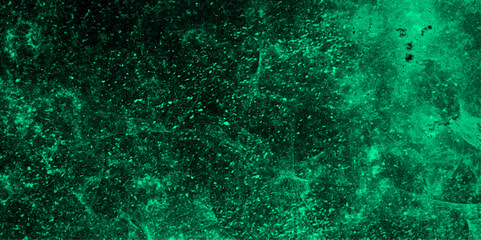 Abstract texture of a deep green, cloudy background with stormy sky or turbulent cosmic nebula. Soft blending between darker forest green areas and lighter emerald or jade. Vivid, moody, atmosphere