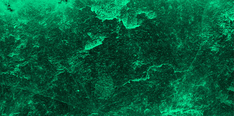 Abstract texture of a deep green, cloudy background with stormy sky or turbulent cosmic nebula. Soft blending between darker forest green areas and lighter emerald or jade. Vivid, moody, atmosphere