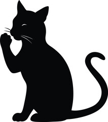 Fototapeta premium Elegant silhouette of a domestic cat cleaning its paw with its tongue