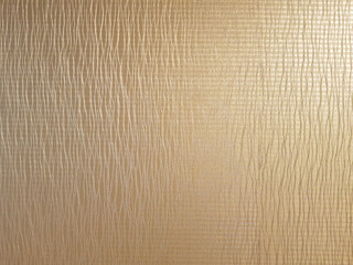 Vintage background with shiny gold luxury texture, rough lines pattern, golden backdrop or wallpaper idea for wall decoration.