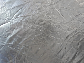 Silver reflective material texture for photography. Studio equipment. Abstract pattern background concept.