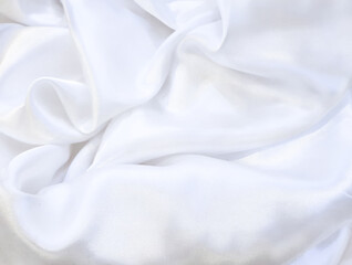 Obraz premium White silk fabric, smooth and shiny, luxurious, abstract pattern background, backdrop for product display.