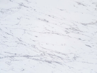 Gray pattern on white marble background. Smooth and luxurious stone texture wallpaper.