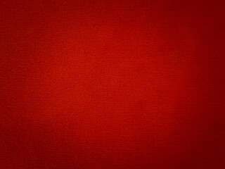 Close-up of red carpet pattern on dark background or wallpaper for background illustration.