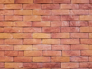 Close-up of brown or red brick wall texture. Construction background concept. Stone construction scene.