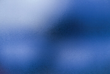Blue rough glass texture. Abstract gradient background concept. Empty backdrop for cool tone blurred letters or wallpaper.