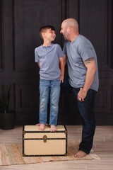 father and son fathers day portrait fun with dad 
