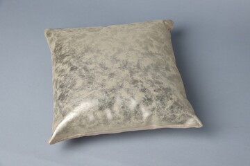 One soft decorative pillow on grey background