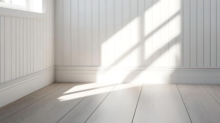Fototapeta premium Sunlight streams in empty white room
