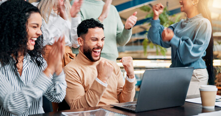 Fist pump, laptop and businessman with team for winning, bonus or creative proposal approval....
