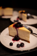 Blueberry cheesecake dessert served at elegant dinner event