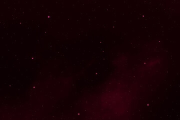Red galaxy space background. Starry night sky. Photo can be used for the concept of Christmas, New Year, Valentines and all celebrations backgrounds.