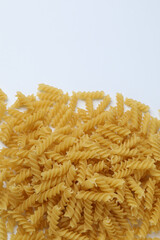 Raw pasta isolated on a white background, contour.