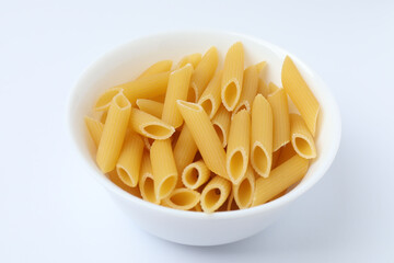 Raw pasta isolated on a white background, contour.