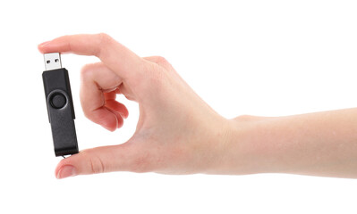 Woman holding usb flash drive on white background, closeup