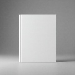 Fototapeta premium A blank, white book stands upright against a gray background, suitable for cover design mockup. The minimalistic style focuses on simplicity and clarity.
