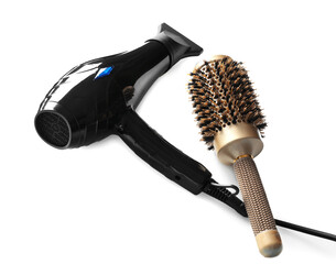 Hair dryer and brush isolated on white. Hairdresser's tools