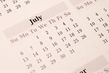 Close-up of July calendar page with minimal design
