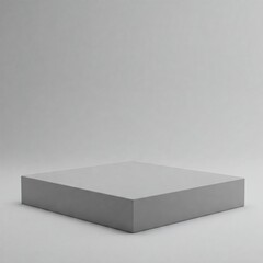 Fototapeta premium A gray, square pedestal or platform sits on a light gray background. The image provides a clean, minimalist aesthetic, suitable for product display.
