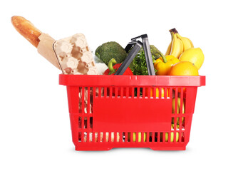 Shopping basket with different food products isolated on white