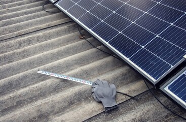 installing a solar panel on the roof