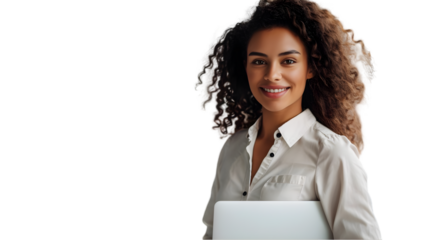 Portrait of a smiling woman with curly hair holding a laptop in a white button down shirt