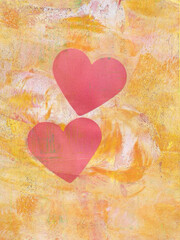 Yellow and orange texture with two red hearts as a symbol of love and connection, printed using the Gelli printing process.