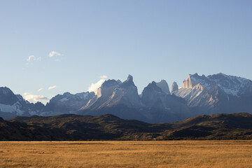 Patagonia, Torres del Paine, Chile. Tourist destination, autumn, April. Snow, mountains, lake, beautiful nature landscape. Postcard