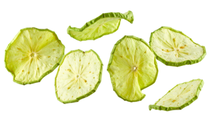Multiple dried green apple slices gently floating on transparent background