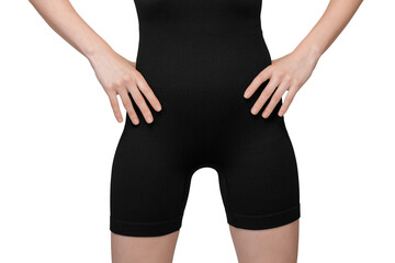 Detailed view of grey ribbed high-waisted shorts on a woman's lower body. The ribbed knit texture...