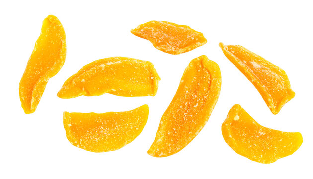 Freeze dried mango chunks hovering on transparent background