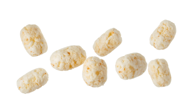 Multiple mini rice snacks hovering on transparent background