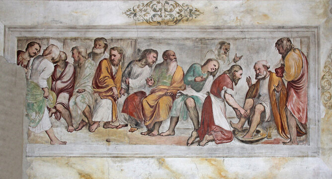 Cristo lava i piedi agli Apostoli; affresco del Romanino nella  chiesa di Santa Maria della Neve a Pisogne (Brescia)