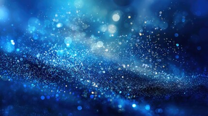 Obraz premium Glowing blue particles dancing with bokeh effect, generating festive sparkle and ethereal mood for celebratory designs and dynamic visual presentations