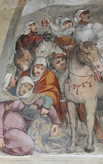 Maria ai piedi della croce; particolare dell'affresco della crocefissione del Romanino nella  chiesa di Santa Maria della Neve a Pisogne (Brescia)