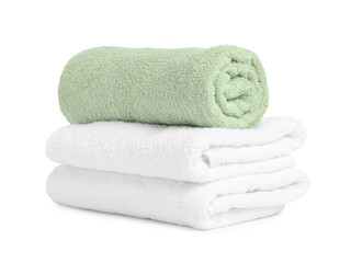 Many folded terry towels isolated on white