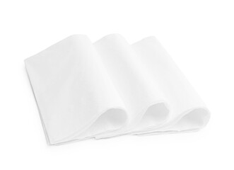Folded disposable paper handkerchiefs isolated on white