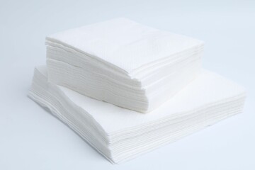 Stack of disposable paper handkerchiefs isolated on white