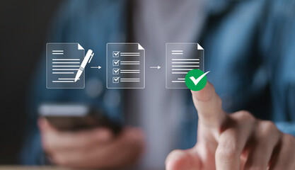 Person with paperless online document approval for business process workflow illustrating...