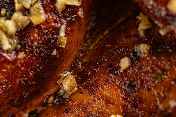 Closeup of roasted grilled whole chicken served at restaurant