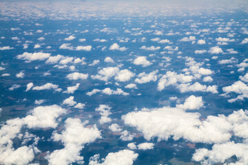 beautiful thick clouds in the sky from the height of the plane