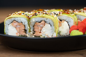 delicious traditional Japanese sushi and rolls on a plate