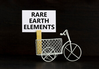 Rare earth elements symbol. Concept words Rare earth elements on beautiful white paper on wooden...