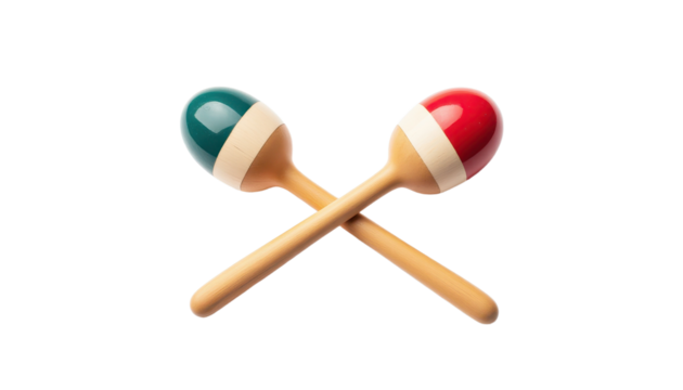 maracas pair with painted wooden handles, placed crossed over each other on white background.