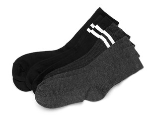 Many different pairs of socks isolated on white, top view