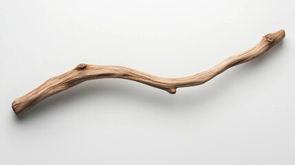 A natural, light brown branch with a small knothole on one end.